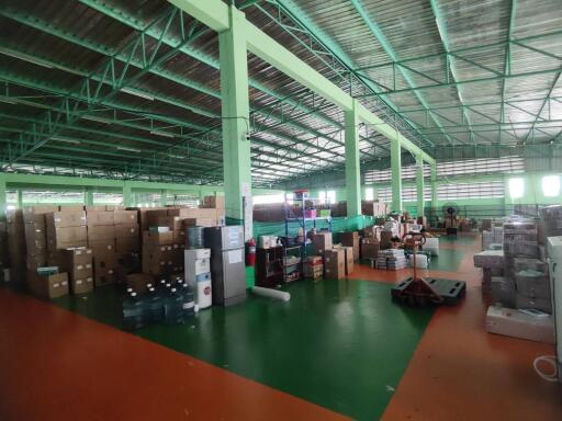 Interior view of a warehouse with boxes and shelves