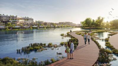 scenic view of a waterfront residential complex with a boardwalk