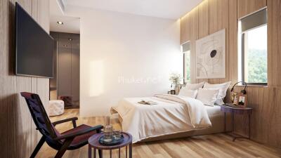 Modern, well-lit bedroom with wooden floor and minimalist decor