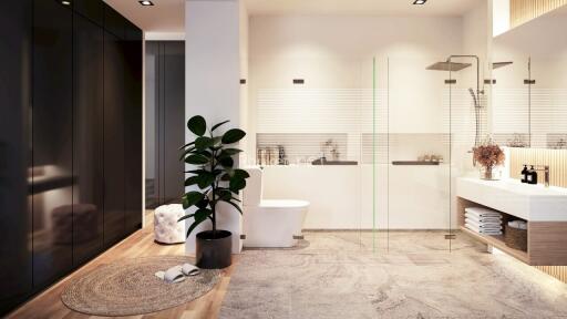 Modern bathroom with black wardrobe, large glass shower, potted plant, and floating vanity