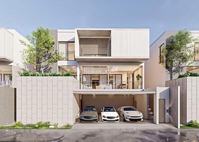 Modern townhouse with multiple cars parked in the driveway