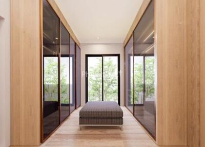 Spacious and modern walking closet with large windows