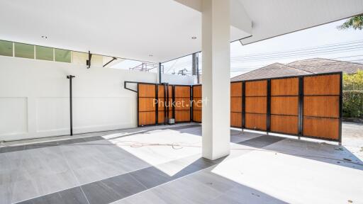 Spacious and well-lit garage with modern flooring