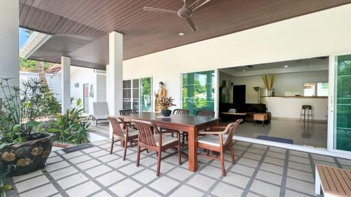 Spacious outdoor patio with dining area