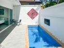 Outdoor area with small pool and seating