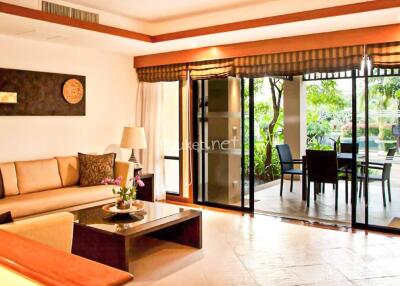 Spacious living room with outdoor patio view