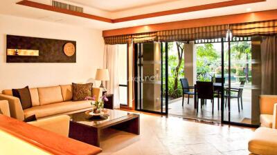 Spacious living room with outdoor patio view