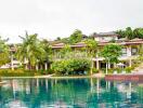 Exterior view of luxury property with a swimming pool