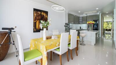 Modern dining and kitchen area with telescope