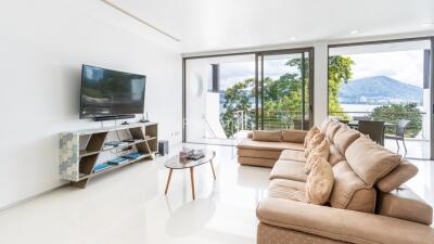 Spacious living room with a large window view