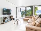 Spacious living room with a large window view