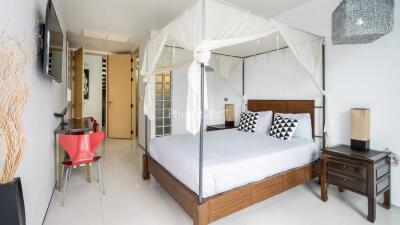 Modern bedroom with canopy bed and contemporary decor