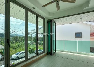 Living area with large windows and a view