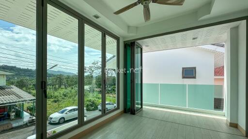 Living area with large windows and a view