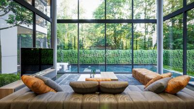 Modern living room with large windows and pool view