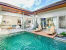 Outdoor pool area with lounge chairs and view into modern living room