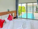 Bedroom with pool view and modern decor