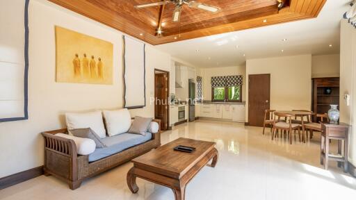 Spacious and bright living room with kitchen and dining area