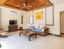 Cozy living room with wooden accent ceiling and modern furniture