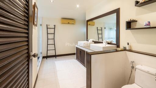 Modern bathroom with double sinks and contemporary decor