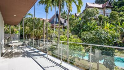 Balcony overlooking garden with outdoor seating