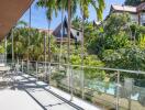 Balcony overlooking garden with outdoor seating