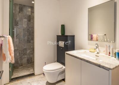 Modern bathroom with shower and vanity