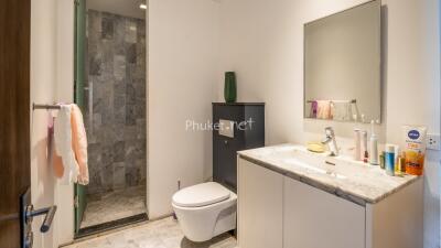 Modern bathroom with shower and vanity