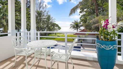 Balcony with outdoor furniture and ocean view