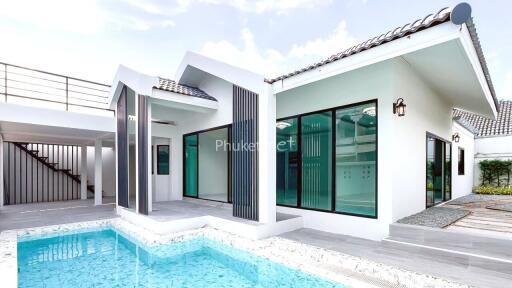 Modern house exterior with swimming pool