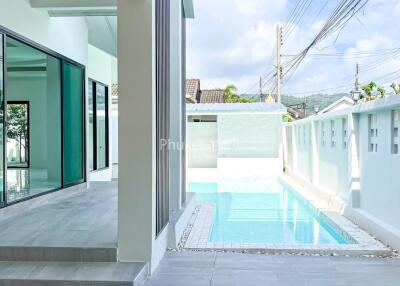 Modern outdoor area with swimming pool
