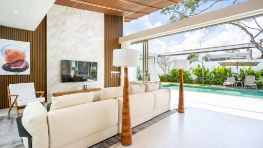 Modern living room with pool view