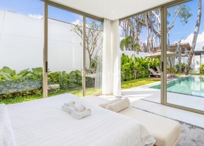 Bright bedroom with pool view