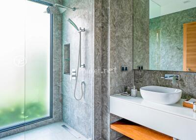 Modern bathroom with a glass shower and sink