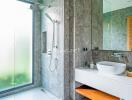 Modern bathroom with a glass shower and sink