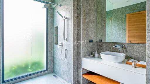Modern bathroom with a glass shower and sink