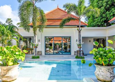 Outdoor view of a house with a swimming pool