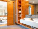 Modern bathroom with wooden accents and dual sinks