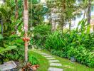 Beautiful garden with lush greenery and stepping stone pathway
