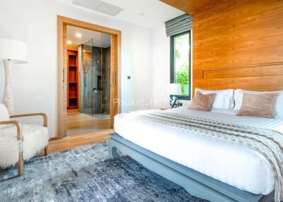 Modern bedroom with cozy decor and ensuite bathroom