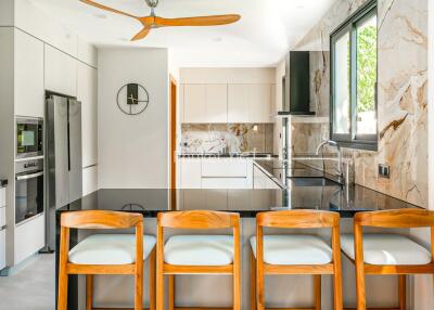 Modern kitchen with island and bar stools