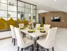 Modern dining area with table setting and view into living room