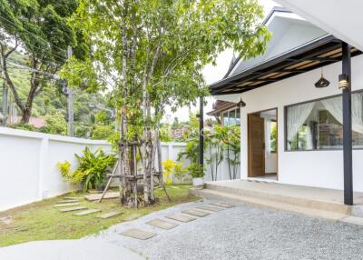 Front view of a house with garden