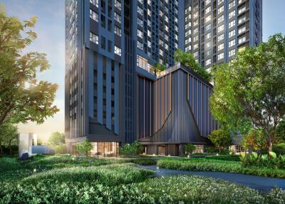 Modern high-rise residential building surrounded by greenery