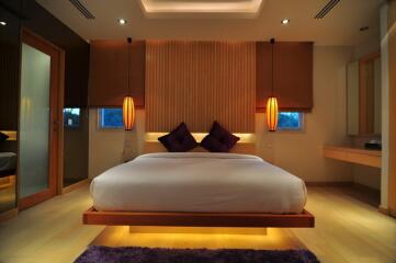 Modern bedroom with mood lighting and minimalist decor