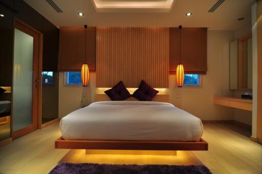 Modern bedroom with mood lighting and minimalist decor