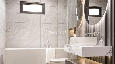 Modern bathroom with marble features and a bathtub