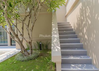 Outdoor area with stairs and greenery