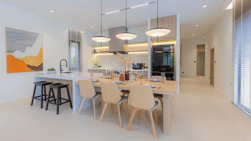 Modern kitchen and dining area with contemporary furniture