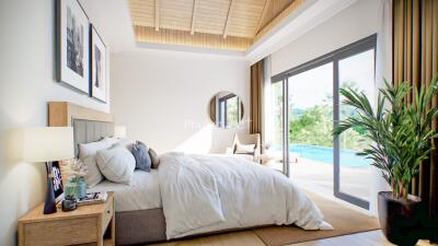 Modern bedroom with large windows and a pool view